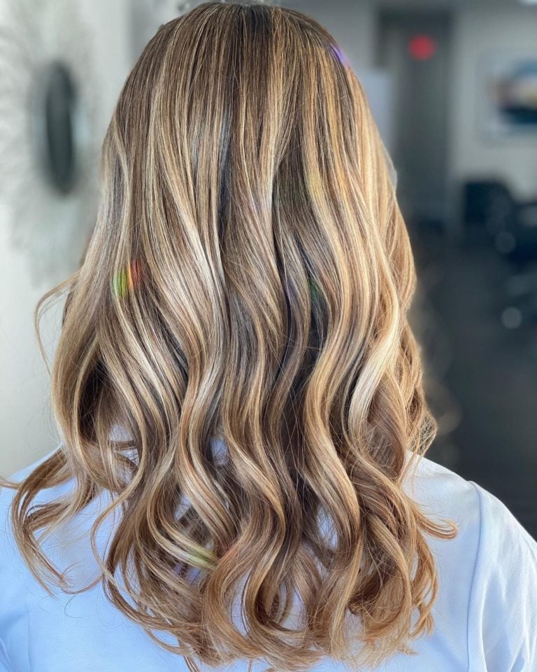 lived-in balayage highlights on wavy hair